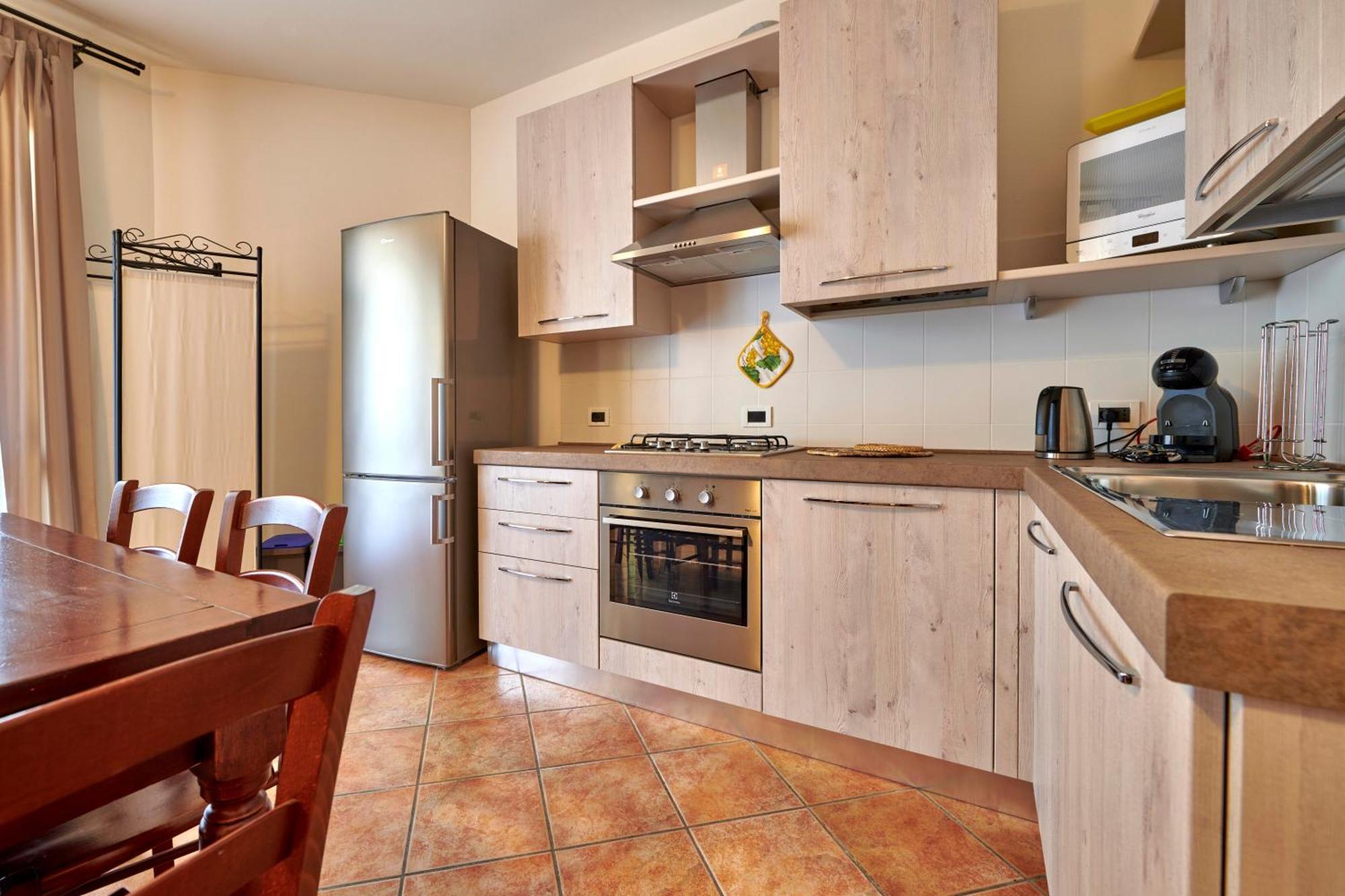 Apartmentsgarda - Baia D'Argento Residence コステロマーノ エクステリア 写真